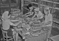 05６・２６熊本大水害　水浸しになった書籍を整理する店員さん＝熊本市上通町の金龍堂書店