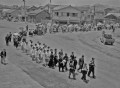 水害１周年慰霊祭の後、白川へ向かう慰霊団＝熊本市安政町