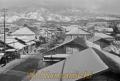 雪化粧した阿蘇の山と町並み＝阿蘇郡高森町